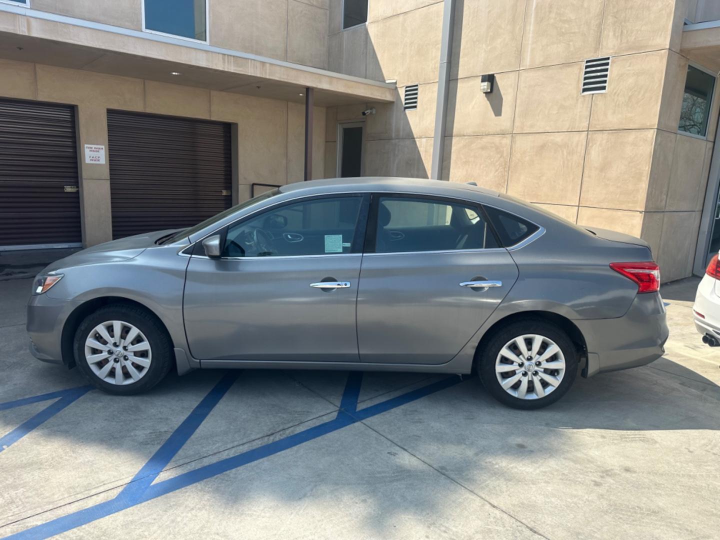 2016 Silver /Black Nissan Sentra FE+ S (3N1AB7AP7GY) with an 1.8L L4 SFI DOHC 16V engine, CVT transmission, located at 30 S. Berkeley Avenue, Pasadena, CA, 91107, (626) 248-7567, 34.145447, -118.109398 - Photo#1